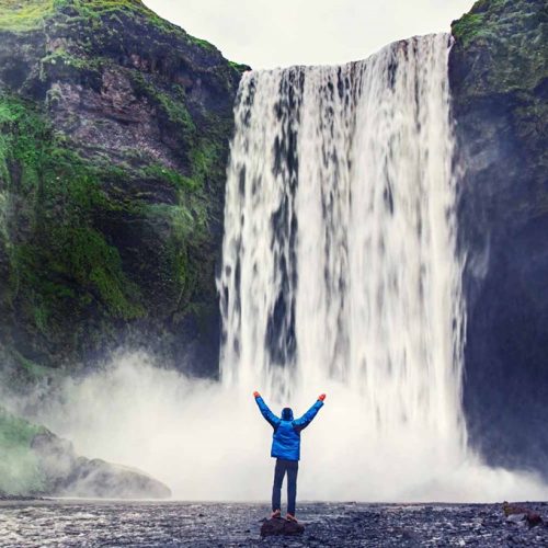 skogafoss-man-near-waterfall-summer-rocks-500x500 skogafoss-man-near-waterfall-summer-rocks-500x500
